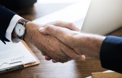 Close-up of two shaking hands at Japanese business meeting