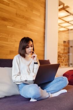 woman studying a language by herself - how to learn a language online