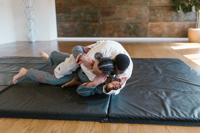 Two people doing martial arts.